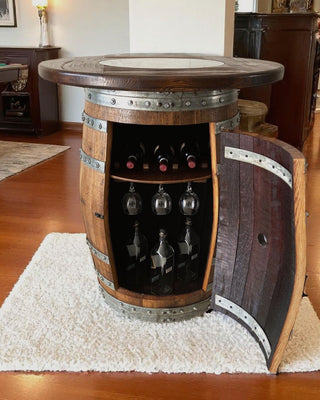 Handcrafted Wine Barrel bar cabinet with a wood-glass top, door open to wine bottles and glasses